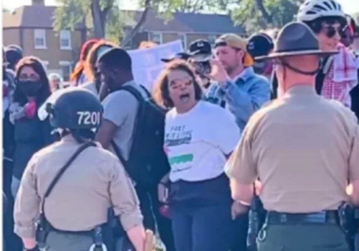 Eman Abdelhadi yelling at police officers during a protest.